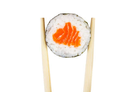 Maki roll with chopsticks isolated on whiteの写真素材