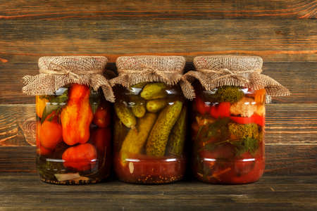 Pickled vegetables on wood backgroundの写真素材