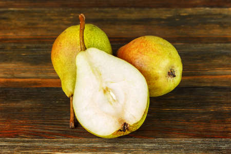 Pears on wooden table close-upの写真素材