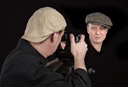 Portrait Photographer with camera on blackの写真素材