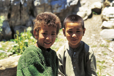 Jammu and Kashmir, India - June 17, 2002: Two boys smilling and looking on Leh Highway also known as National Highway â 1D (NH â 1D) is the most reliable and one of the only two ways to reach Leh â Ladakh by roadのeditorial素材