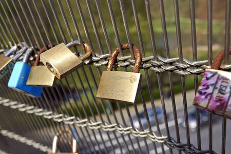 Love padlocks on the bridge Tervueren avenue in Brussels, Belgium