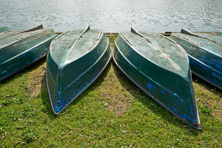 The alignment of boats along the bankの写真素材