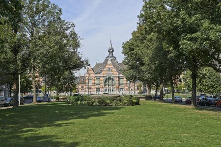 BRUSSELS, BELGIUM - AUGUST 31, 2015: The Schaerbeek railway station renovation before the inauguration of the Train World museum. Front view from the Huart Hamoir Avenueのeditorial素材