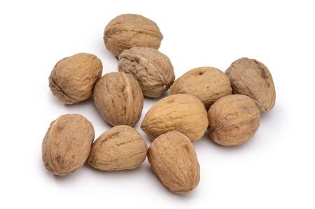 Small Group of Closed Walnuts Isolated on White Background