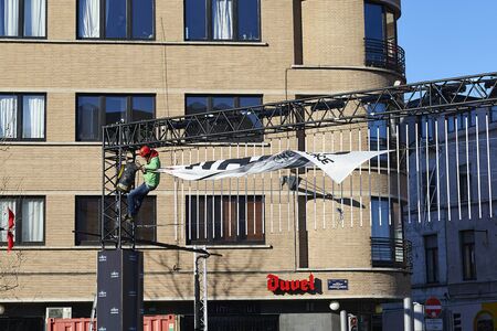 BRUSSELS, BELGIUM - January 20, 2017: Greenpeace organise demonstration for Bridges Not Walls: anti-Trump protesters have dropped banners on the bridge between Molenbeek and Brussels centerのeditorial素材