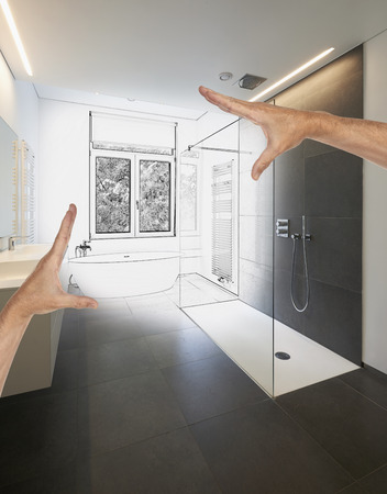 Planned renovation of a Luxury modern bathroom, Bathtub in corian, Faucet and shower in tiled bathroom with windows towards gardenの写真素材