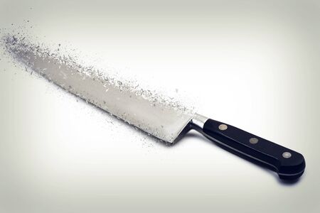 close up of a used knife shattering on gradiant background
