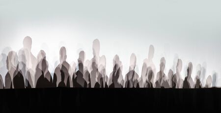 Lot of people shadows on white wallの写真素材