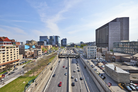 MONTREAL, QUEBEC, CANADA - 17 MAY 2017: Ville-Marie highway with lot of traffic in Dowtown Montreal, Canada. Shot from above a terraced buildingのeditorial素材