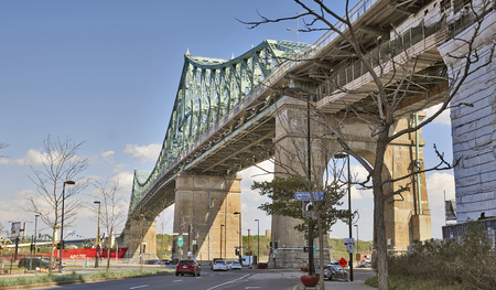 MONTREAL, QUEBEC, CANADA - 18 MAY 2017: Jacques Cartier Bridge in a blue sky at Montreal, Canadaのeditorial素材