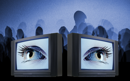 Old fashioned television with female eye against matrix screen
