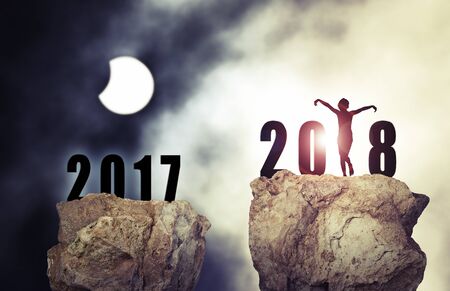 Big rock floating against moon background for the new year 2018