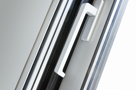 Sliding glass door handle opening on gardenの写真素材