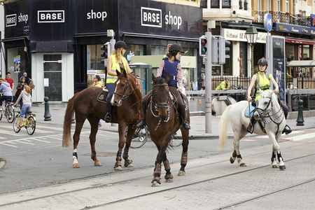 Brussels, Belgium - September 21, 2014: Bicyclist, joggers,skateboarder,horses and walkers enjoy Car Free Streets sunday on Tervueren Ave in Brussels-Belgiumのeditorial素材