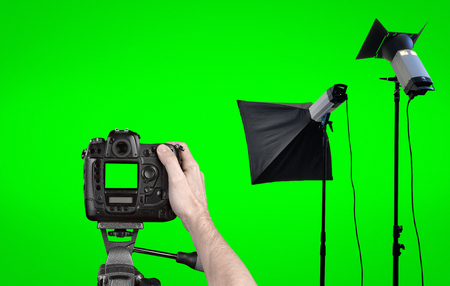 Studio lighting equipment isolated on Green background with clipping pathの写真素材
