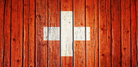Textured Swiss flagged wooden table from aboveの写真素材