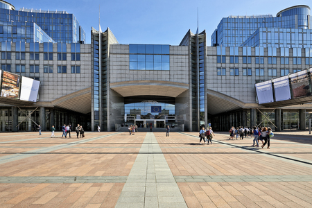 Brussels, Belgium -September 20, 2018:  Some people enjoy september sunny day in front of the European Goverment office at Leopold space in Brusselsのeditorial素材
