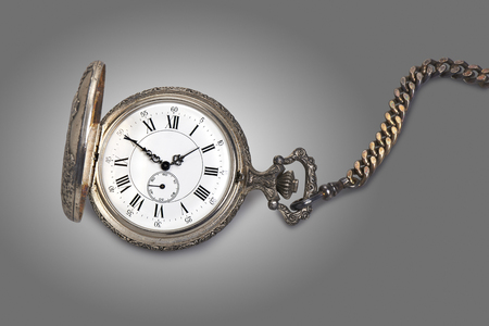 Antique pocket watch isolated on white backgrounの写真素材