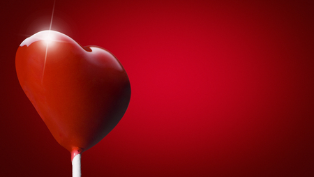 Heart-shaped lollipop for the Valentine dayの写真素材