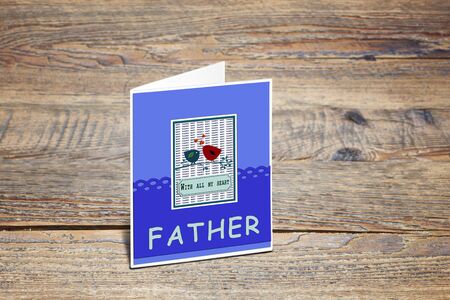 Greetings card for the Father day on wooden tableの写真素材