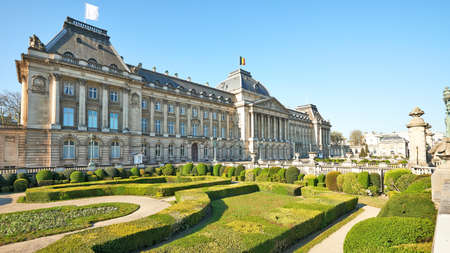 Brussels, Belgium - April 05, 2020: White flag floating on the roof from the Royal Palace during the confinement period.The Palace intends to express its solidarity with the nursing staff.のeditorial素材