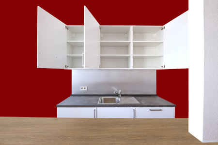 Minimalist swedish furniture from kitchen with shelves open and wooden counterの写真素材