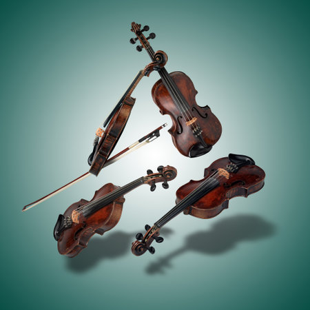 Floating Set of classical violin instrument on green gradient backgroundの写真素材