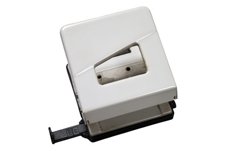 A machine for making holes in sheets of paper isolated