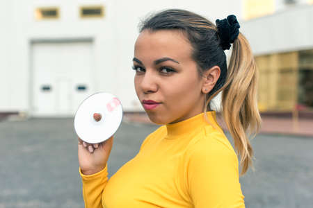 girl in a dress in the style of discoの写真素材