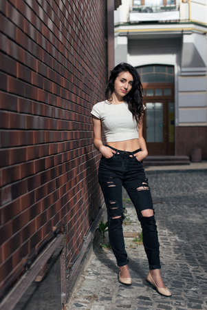 Young brunette with curly hair