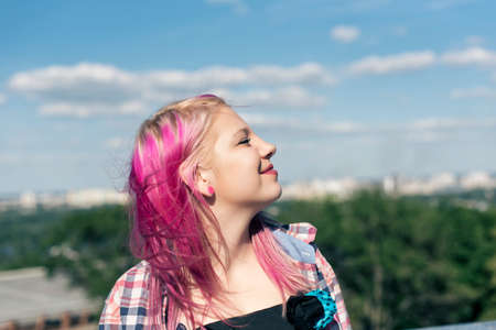 Pretty girl with pink hairの写真素材