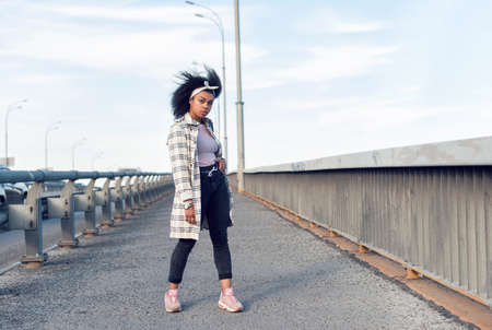 autumn walk with a dark skinned girlの写真素材