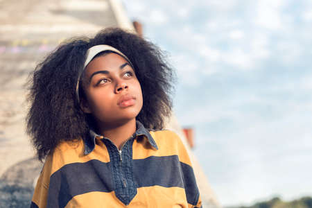 autumn walk with a dark skinned girlの写真素材