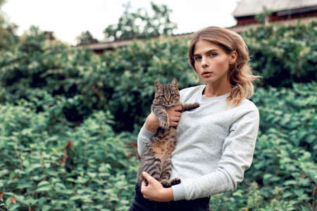 Autumn walk with a young girl in the cityの写真素材