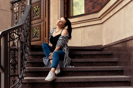 Photoshoot of a girl in urban residential neighborhoodsの写真素材