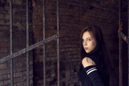 Summer city walks with a young brunetteの写真素材