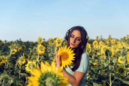 Summer walk in the countryside with a girlの写真素材