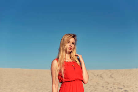 Summer walk on the hot sand dunesの写真素材