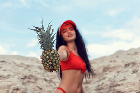 Beautiful brunette with long black curly hairの写真素材