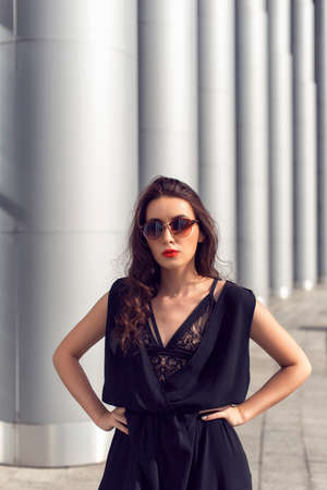 Spring walk in the city in fashionable clothesの写真素材