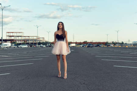 Photoshoot girls in the parking lot of the supermarketの写真素材