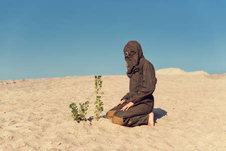 Young girl in a post apocalyptic worldの写真素材