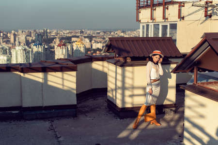 Stylish young girl in an autumn lookの写真素材