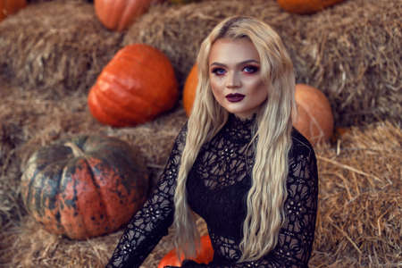 Halloween location with a young blondeの写真素材