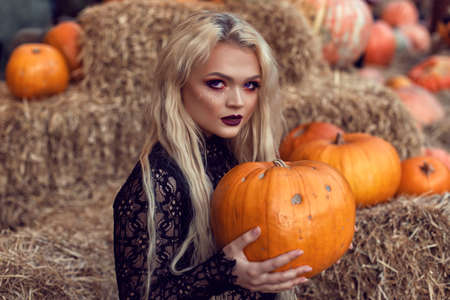 Halloween location with a young blondeの写真素材