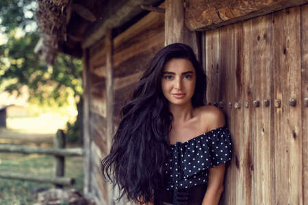 Photoshoot with a brunette in an old village