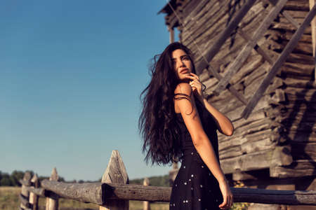 Photoshoot with a brunette in an old village