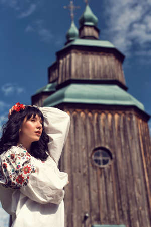 Girl in a folk costume in a national park