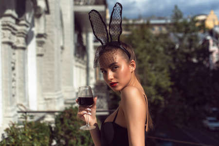 Young girl with red lips in studioの写真素材